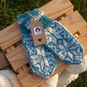 Child Sized Mittens in a Snowflake Pattern.